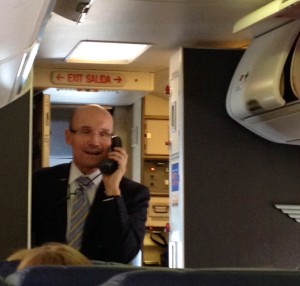 Southwest Airlines Flight Attendant Todd sings for his captive audience.